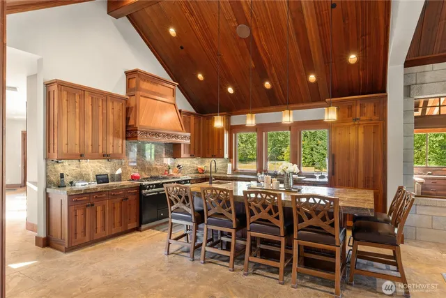 a view of a dining room with furniture window and outside view