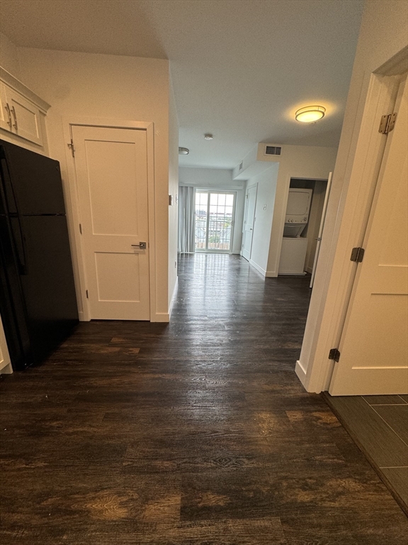 6 Needhams Landing Road, Unit 503 Lynn, MA 01905 - Photo 3 of 9 a view of a livingroom with wooden floor