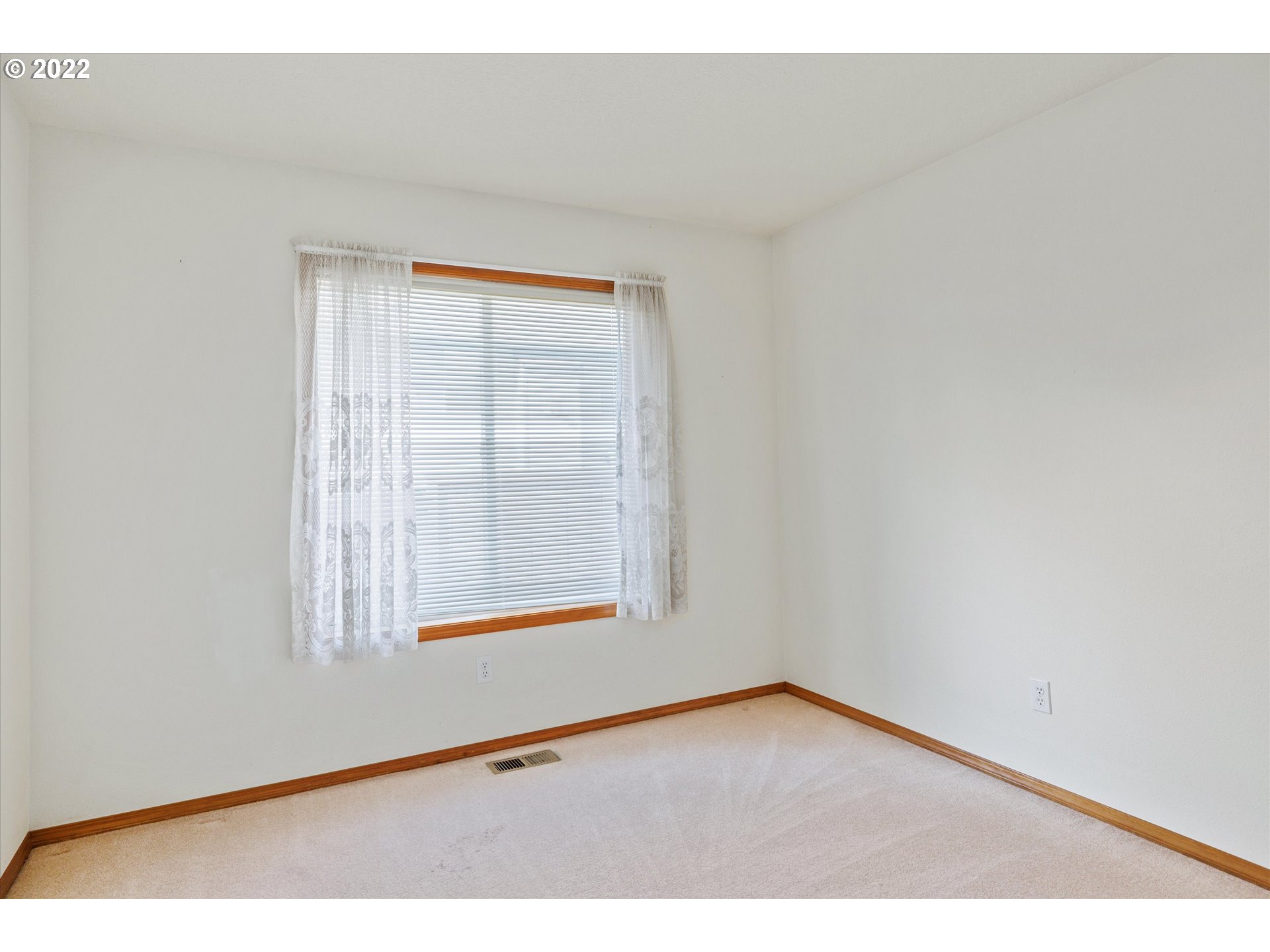 36930 Eldridge Drive Sandy, OR 97055 - Photo 11 of 32 a view of an empty room with a window
