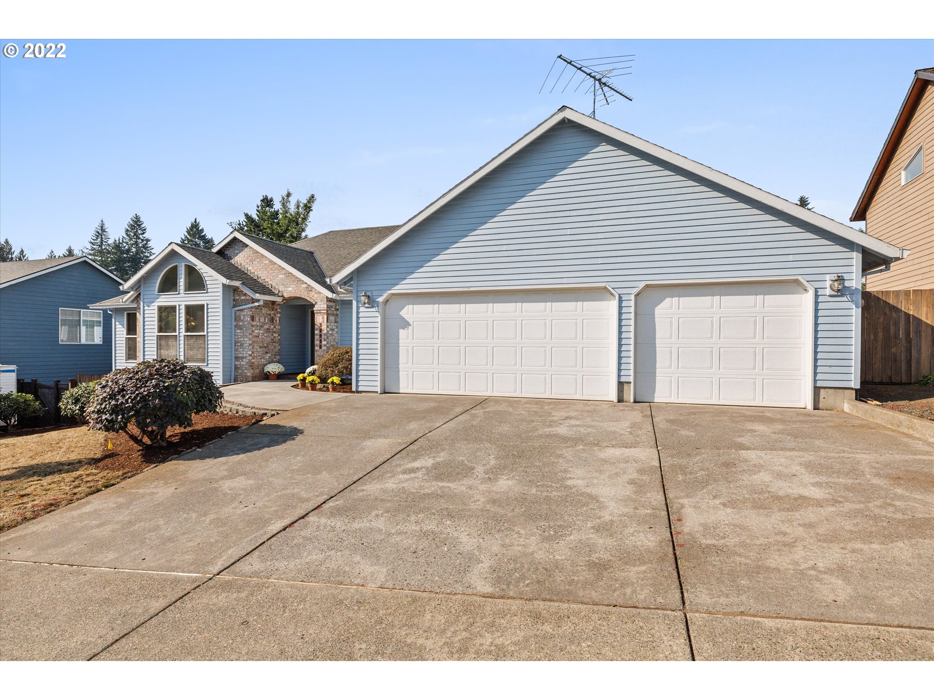 36930 Eldridge Drive Sandy, OR 97055 - Photo 32 of 32 a view of a house with a yard and potted plants