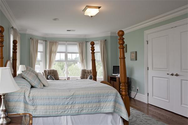 11 Cranberry Lane Hingham, MA 02043 - Photo 11 of 16 a bedroom with a large bed and a window