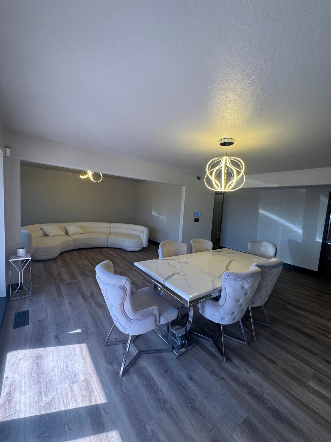 5931 Claribel Road Oakdale, CA 95361 - Photo 14 of 29 a view of a dining room with furniture and wooden floor