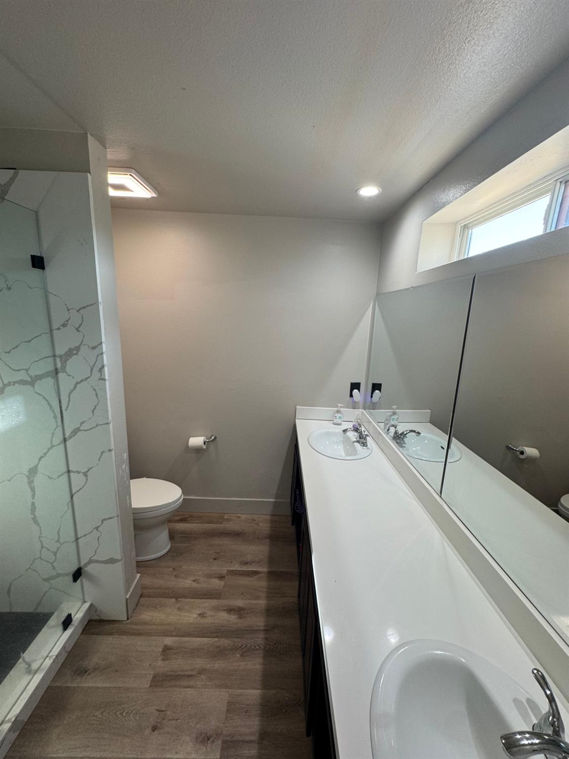 5931 Claribel Road Oakdale, CA 95361 - Photo 20 of 29 a bathroom with a sink a toilet and shower