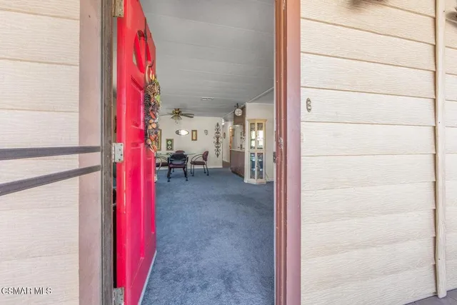 a view of a living room area with furniture