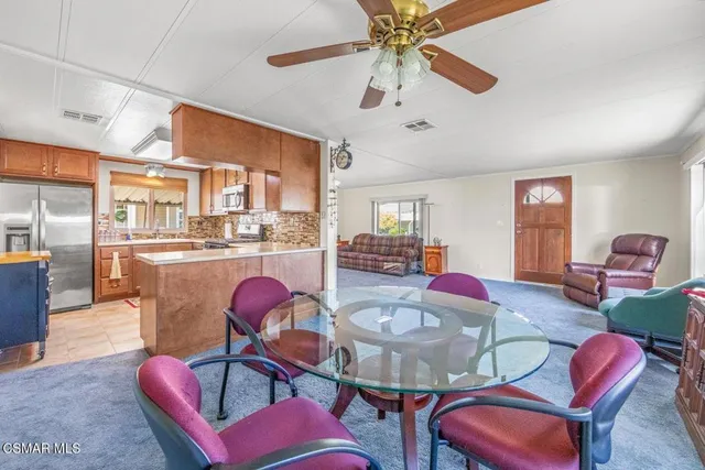 a view of a dining room with furniture