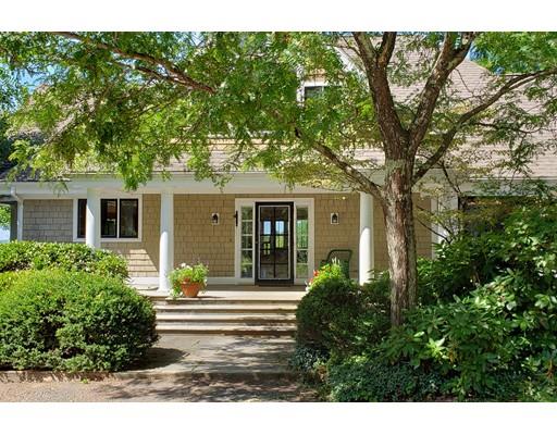 232 Still River Road Harvard, MA 01451 - Photo 1 of 41 a front view of a house with a garden