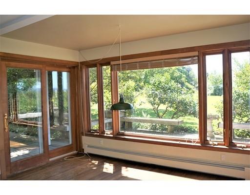 232 Still River Road Harvard, MA 01451 - Photo 16 of 41 a living room with a large window