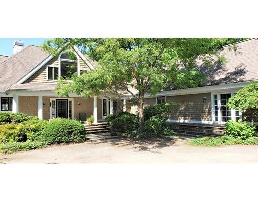 232 Still River Road Harvard, MA 01451 - Photo 2 of 41 a front view of a house with a yard and potted plants