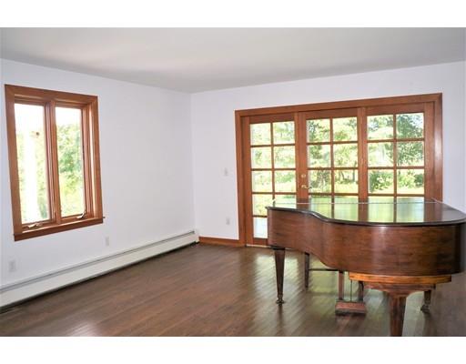 232 Still River Road Harvard, MA 01451 - Photo 23 of 41 a room with a table and chair