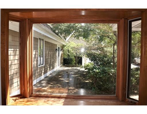 232 Still River Road Harvard, MA 01451 - Photo 24 of 41 a view of a porch with a floor to ceiling window and outside view
