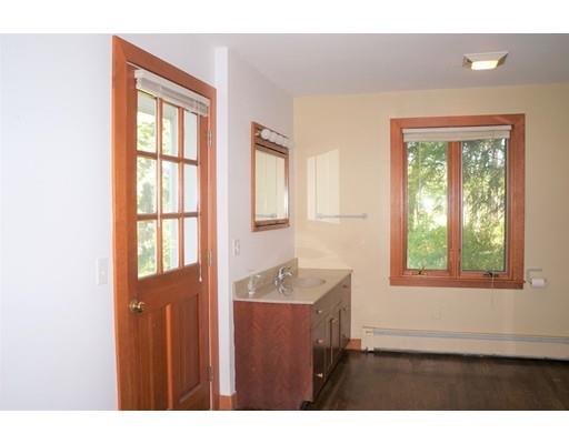 232 Still River Road Harvard, MA 01451 - Photo 25 of 41 a bathroom with a sink and a mirror