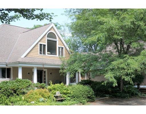 232 Still River Road Harvard, MA 01451 - Photo 3 of 41 a front view of a house with a yard