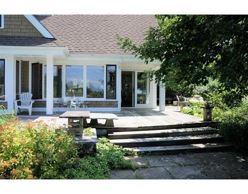 232 Still River Road Harvard, MA 01451 - Photo 6 of 41 a swimming pool with outdoor seating and garden