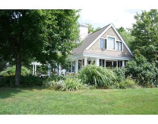 232 Still River Road Harvard, MA 01451 - Photo 7 of 41 a front view of a house with a garden