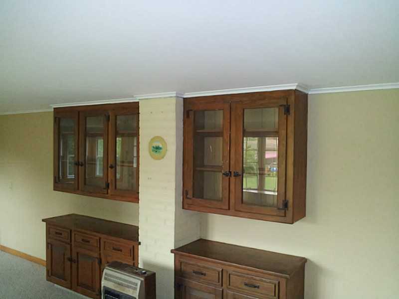 235 Foddering Farm Road Narragansett, RI 02882 - Photo 14 of 25 Den/Family/Great Room. Built-in cabinets and chimney for supplemental heat