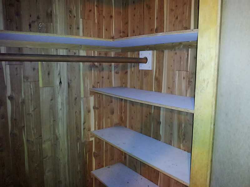 235 Foddering Farm Road Narragansett, RI 02882 - Photo 17 of 25 Storage. Cedar storage closet in the basement
