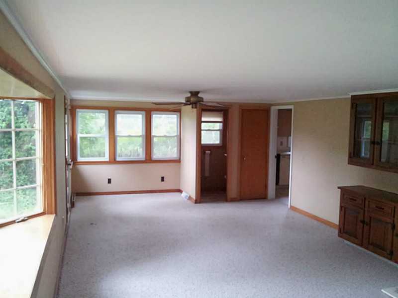 235 Foddering Farm Road Narragansett, RI 02882 - Photo 6 of 25 Den/Family/Great Room. Newly carpeted, sheetrocked and painted family room