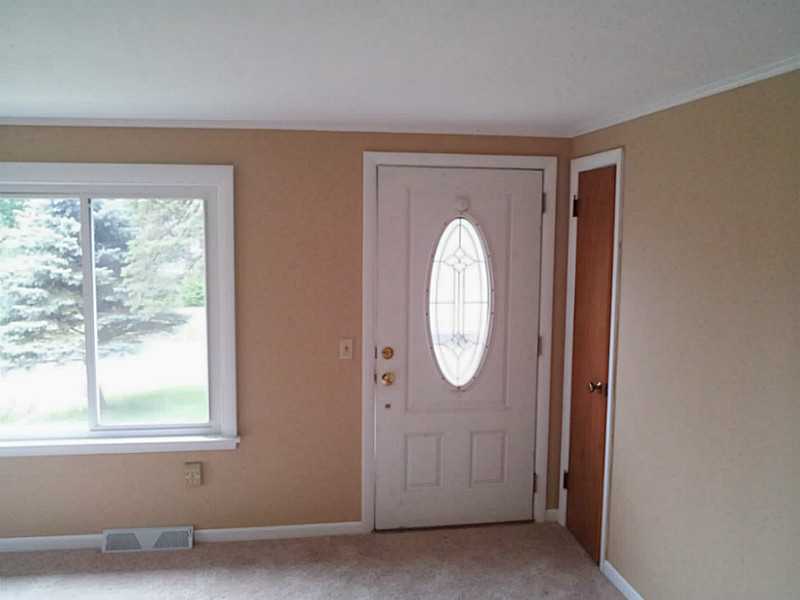 235 Foddering Farm Road Narragansett, RI 02882 - Photo 7 of 25 Living Room. Bright living room, fresh paint and new carpet
