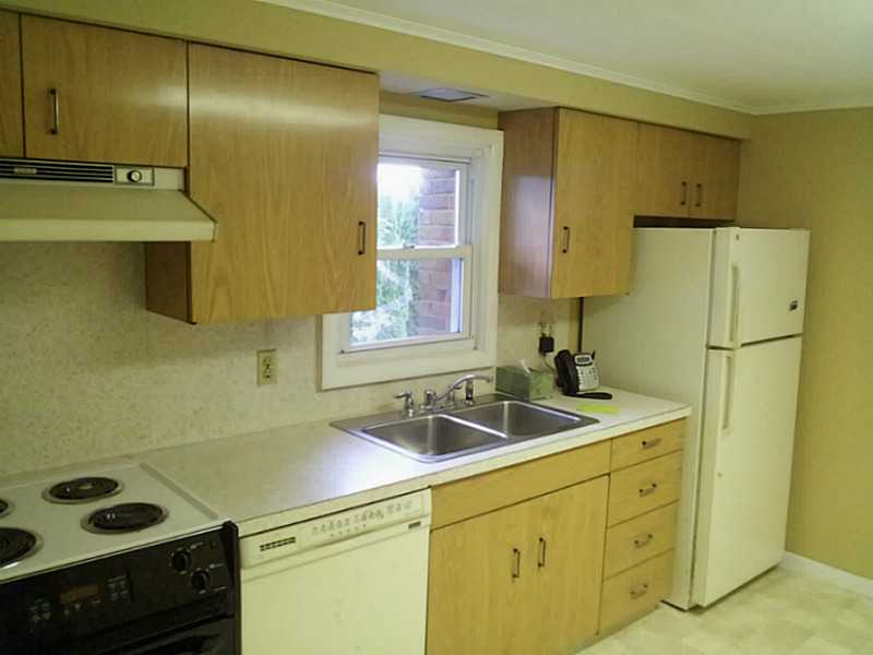 235 Foddering Farm Road Narragansett, RI 02882 - Photo 8 of 25 Kitchen. Older kitchen. Good functional space