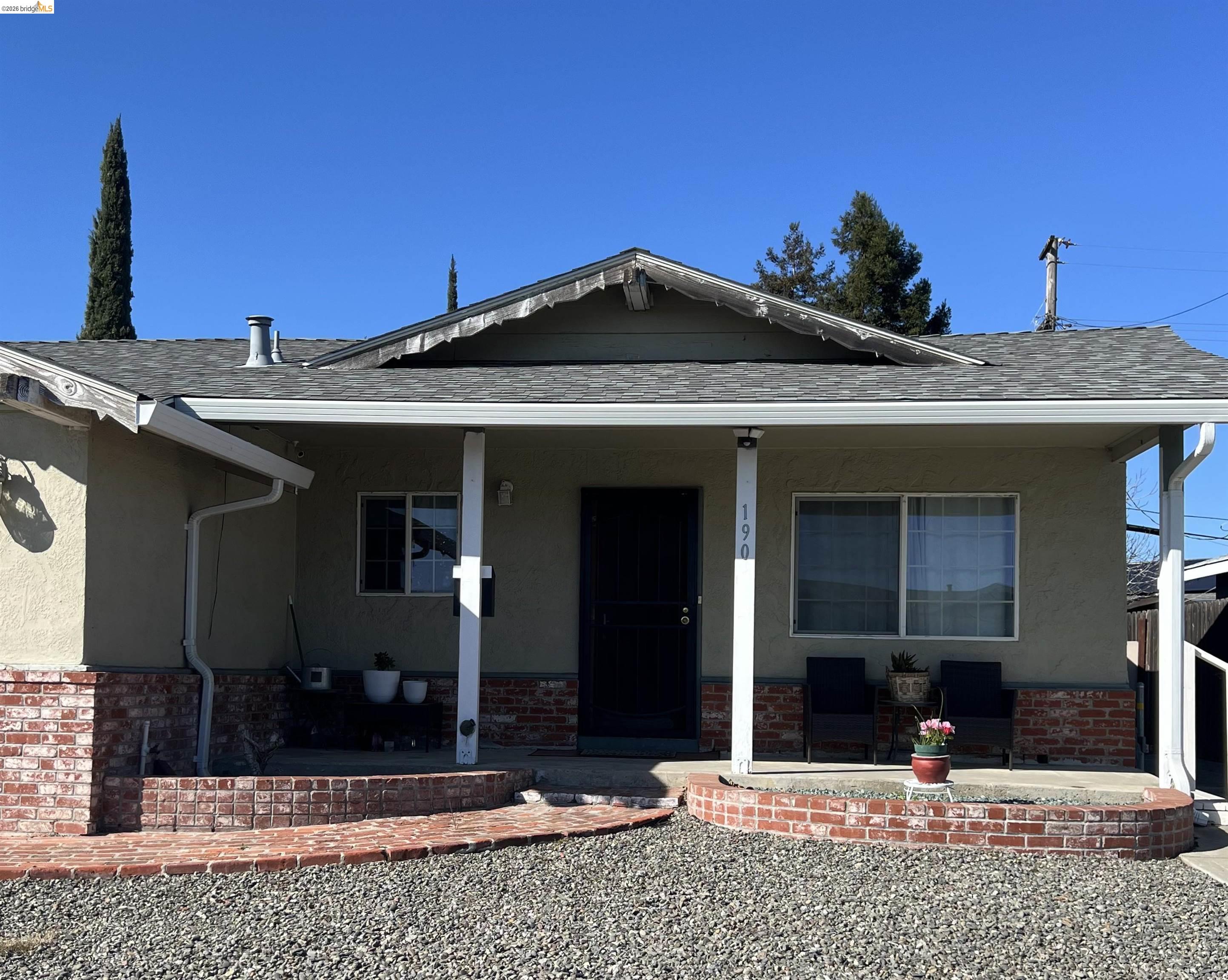 190 Tahoe Drive Rio Vista, CA 94571 - Photo 2 of 44 View of front of home with a porch, roof with shingles, and stucco siding