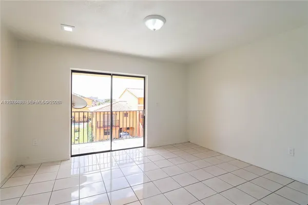 a bathroom with a sink vanity and a mirror