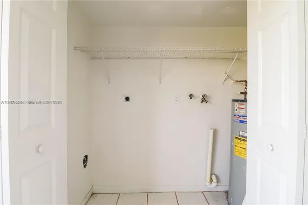 a view of swimming pool with patio