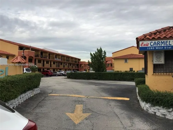 a view of a building with a street