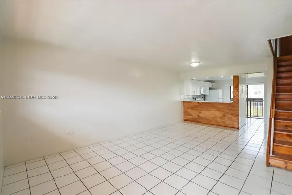 a view of an entryway with stairs