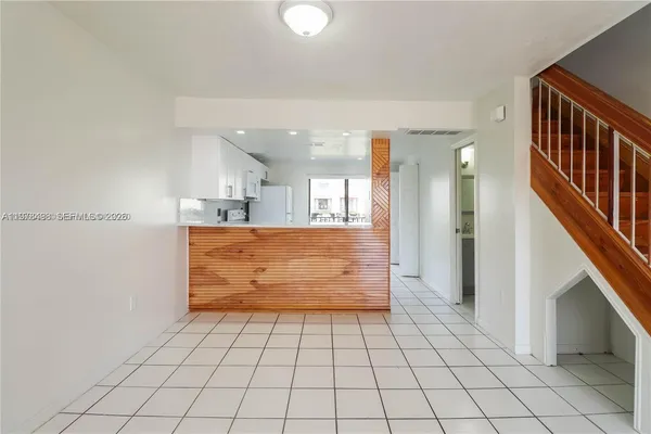 a view of an entryway with stairs