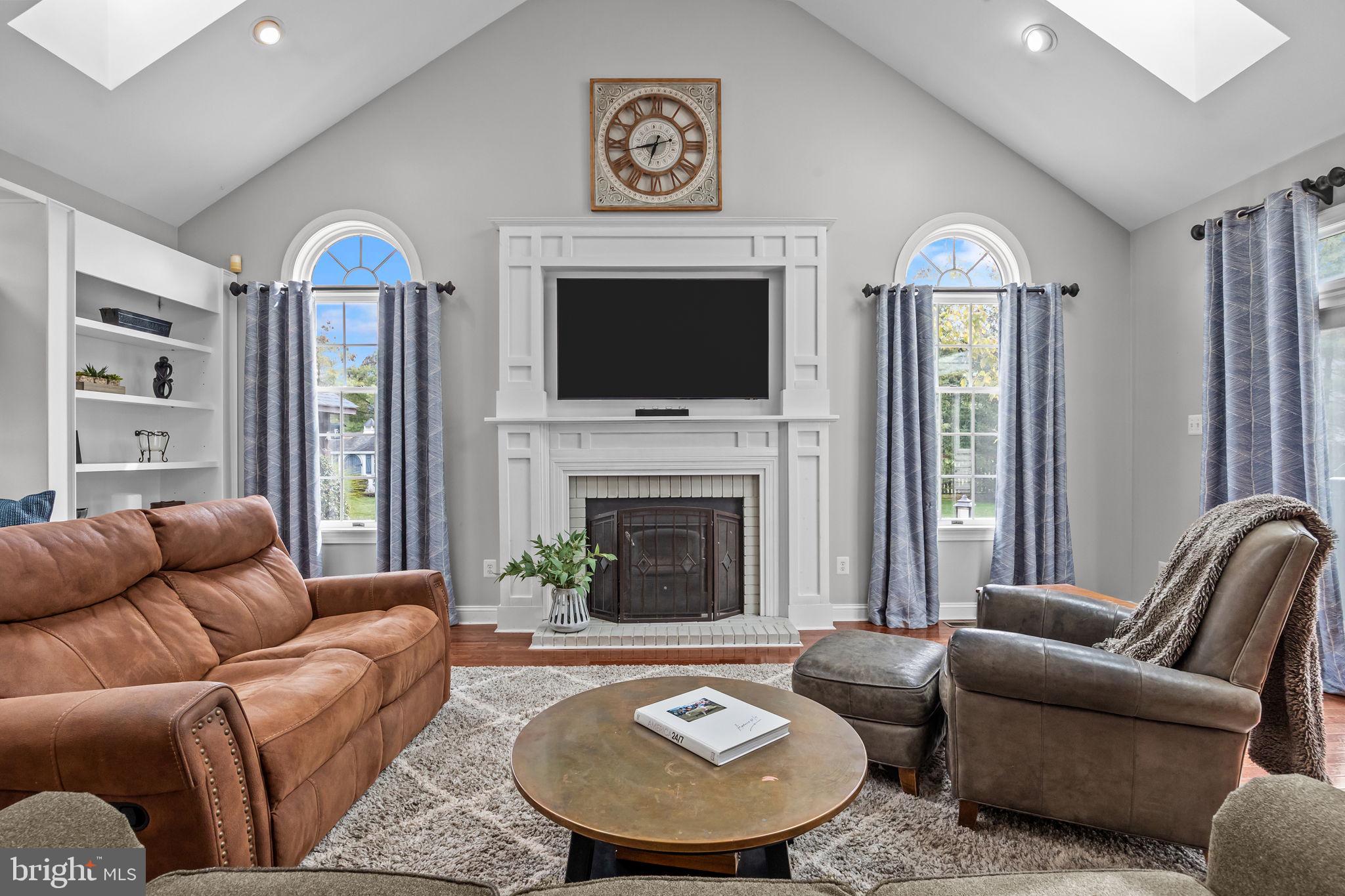 4605 Twinbrook Circle Doylestown, PA 18902 - Photo 18 of 53 Family room with wood fireplace, built-ins ...