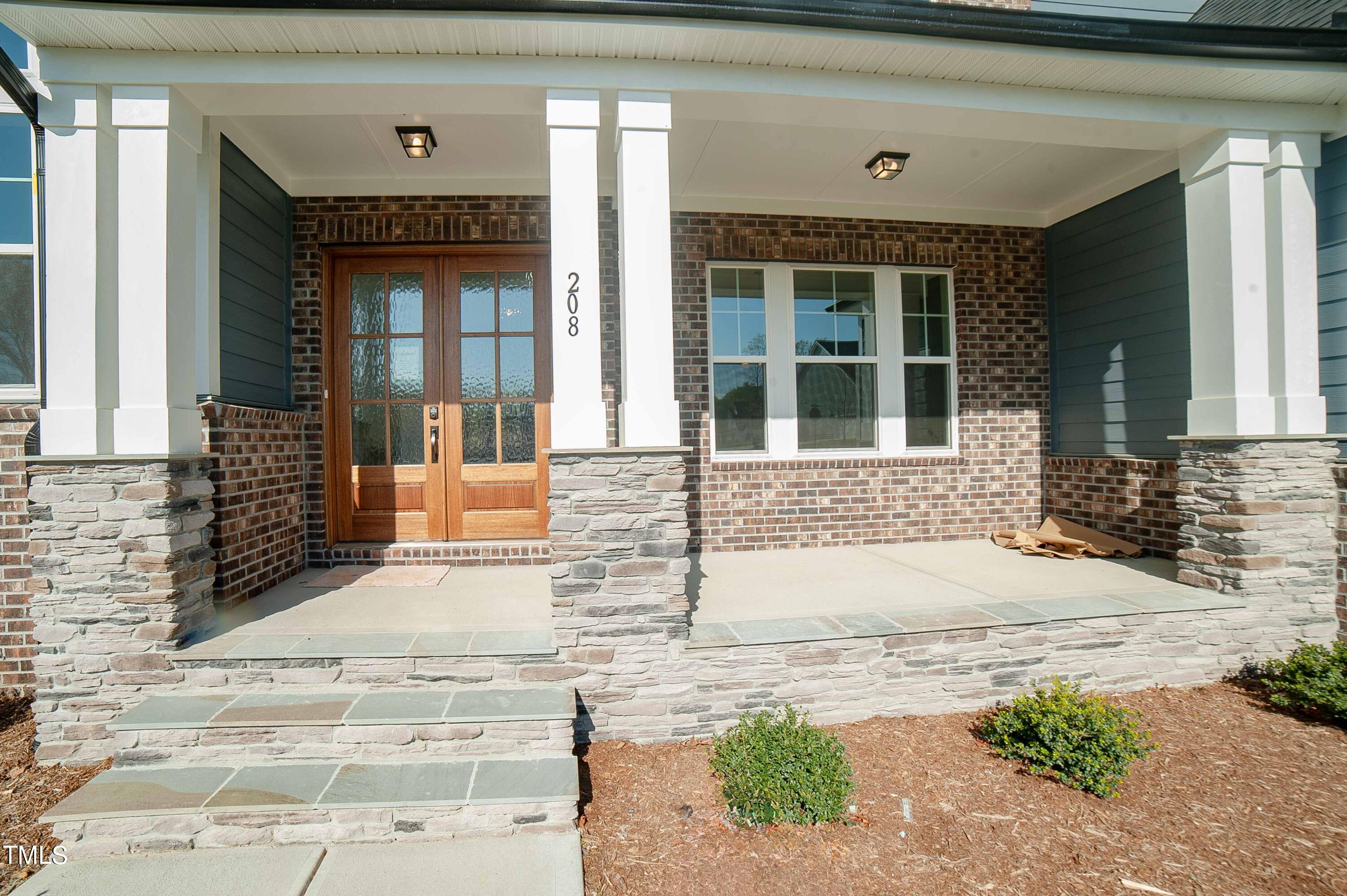 208 Streamside Drive Angier, NC 27501 - Photo 3 of 35 WFDS-0112-00_Champlain A_Front Porch