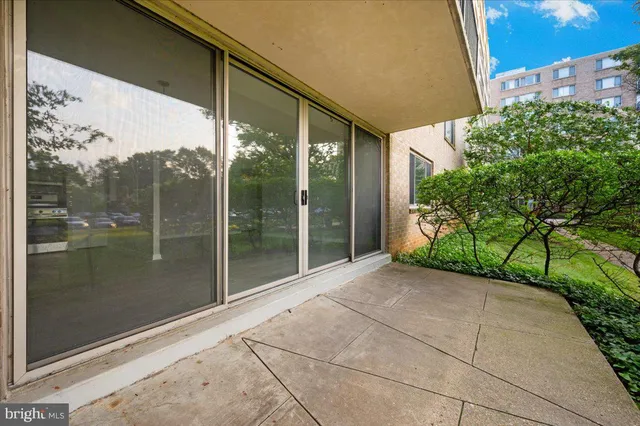 a porch with a glass door