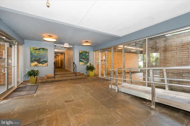 a view of an empty room and window