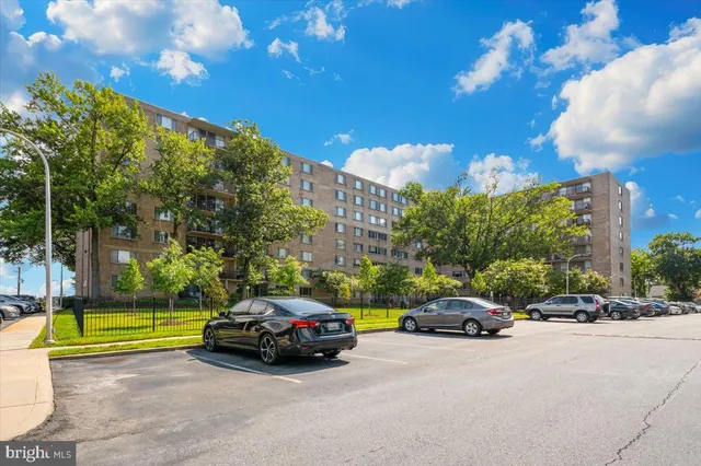 a view of a cars parked in front of a house