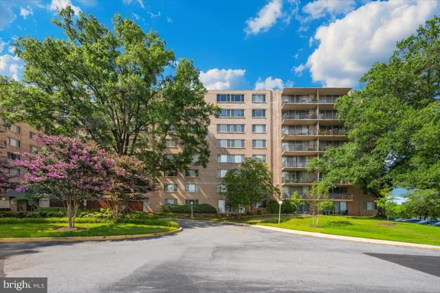 a view of a building with a yard