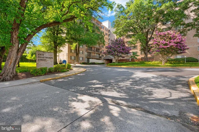a view of a house and a yard