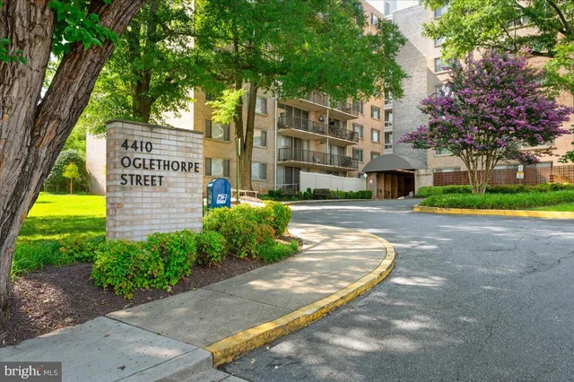 a view of street with tall buildings