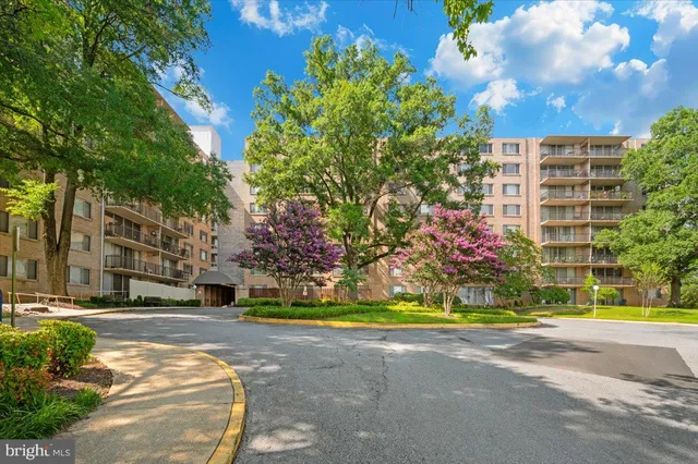 a view of a building with a street