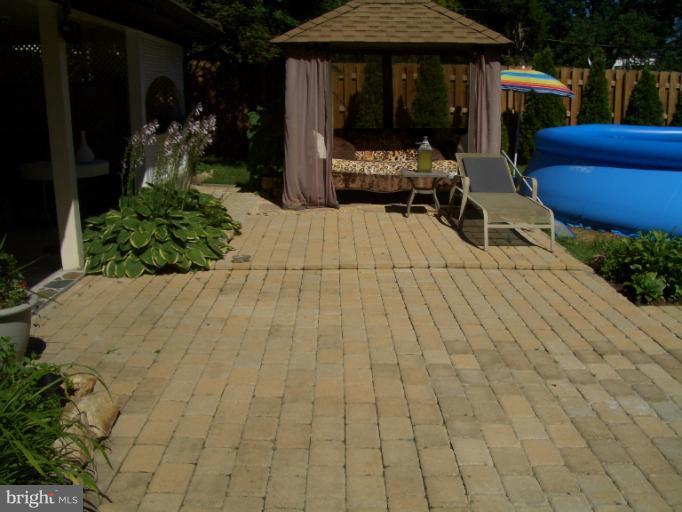 Exterior (Rear) Stoned Patio with Gazebo