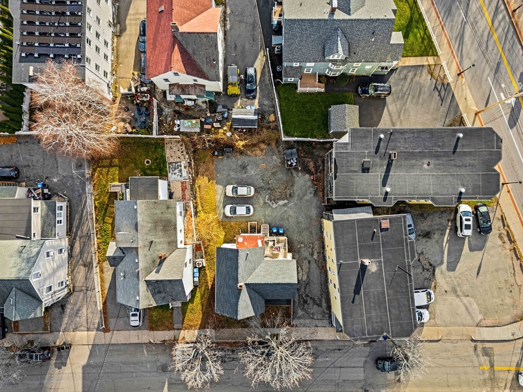 11 Derby Street Waltham, MA 02453 - Photo 15 of 23 an aerial view of residential houses with outdoor space