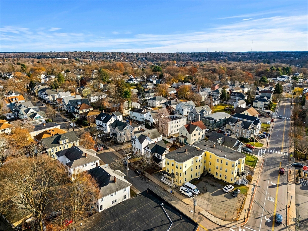 11 Derby Street Waltham, MA 02453 - Photo 7 of 23 an aerial view of residential building and parking space