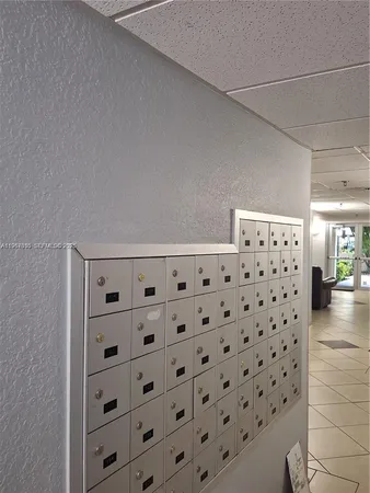 a view of swimming pool with outdoor seating and a yard