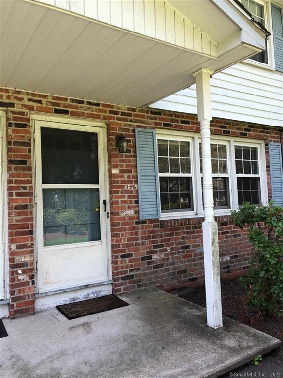a front view of a house with a garage