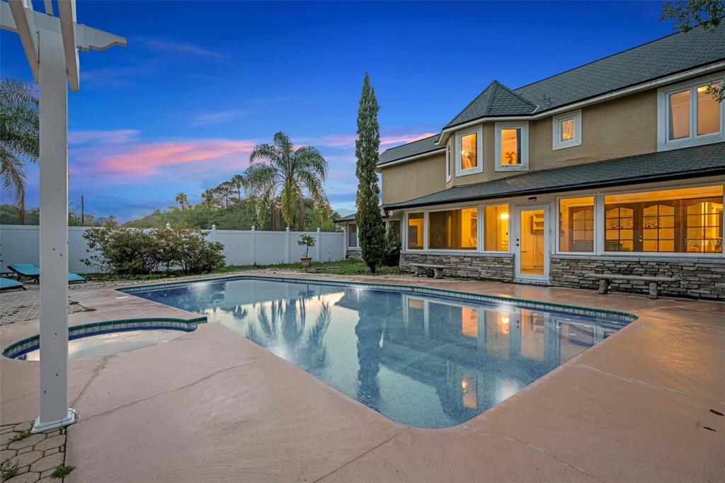 1415 Brumley Road Chuluota, FL 32766 - Photo 15 of 46 a view of a house with swimming pool