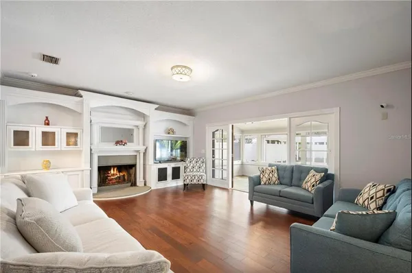 a kitchen with stainless steel appliances a white stove top oven and cabinets
