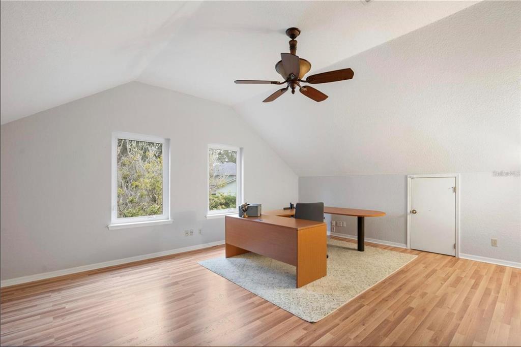 1415 Brumley Road Chuluota, FL 32766 - Photo 8 of 46 a living room with furniture and a window