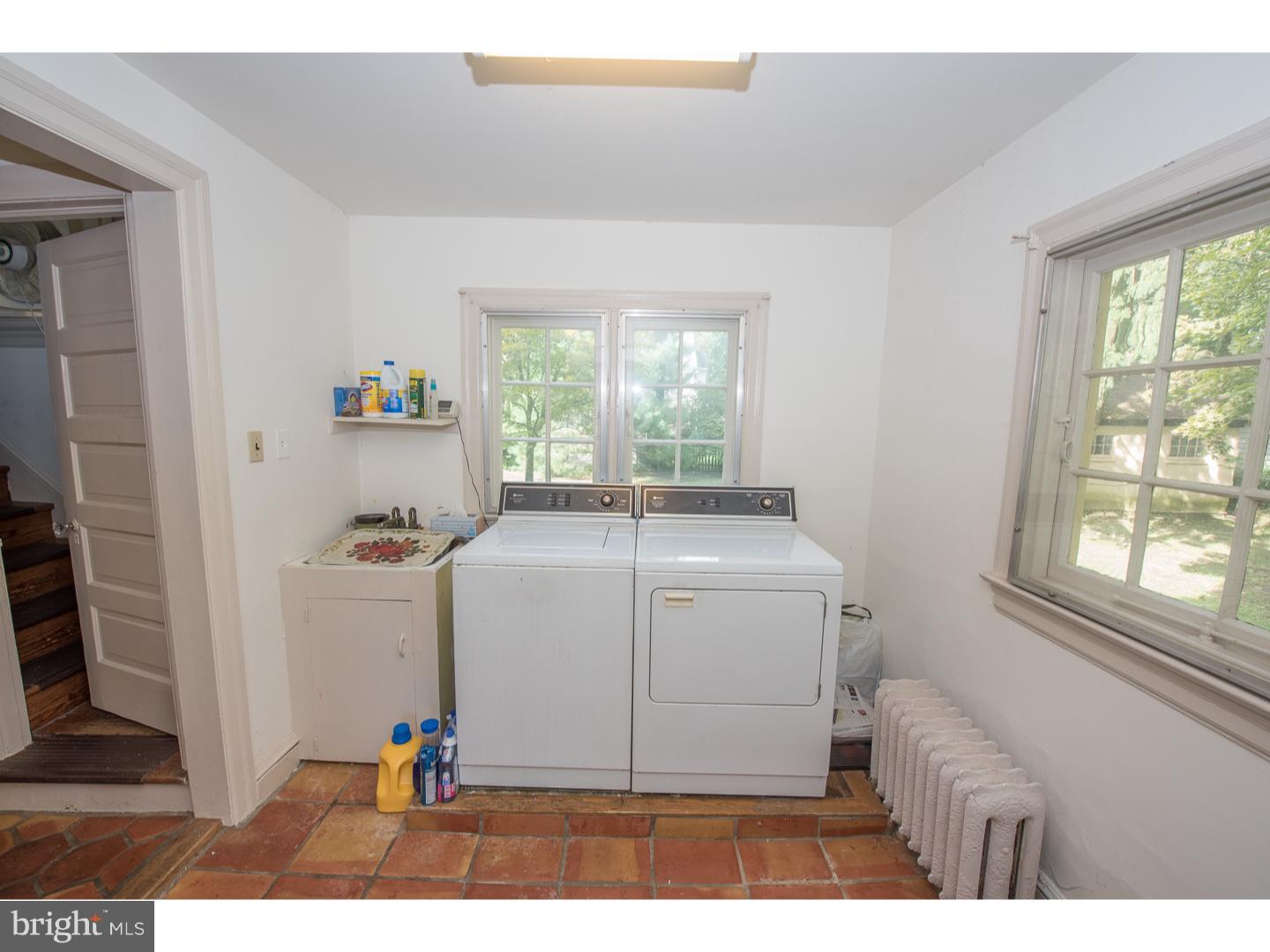 540 Manor Road Wynnewood, PA 19096 - Photo 13 of 25 a utility room with closet dryer and washer