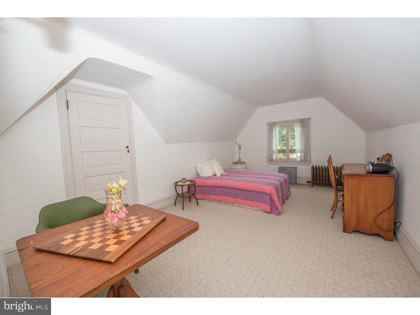 540 Manor Road Wynnewood, PA 19096 - Photo 20 of 25 a bedroom with furniture and a window