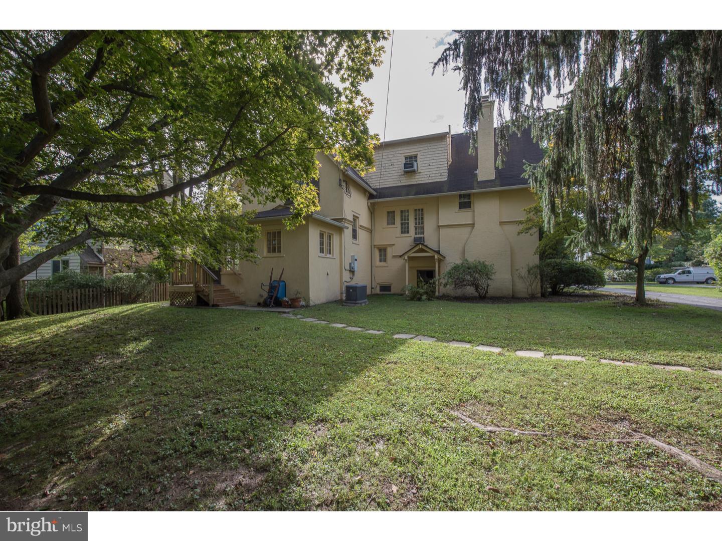 540 Manor Road Wynnewood, PA 19096 - Photo 25 of 25 a backyard of a house with lots of green space