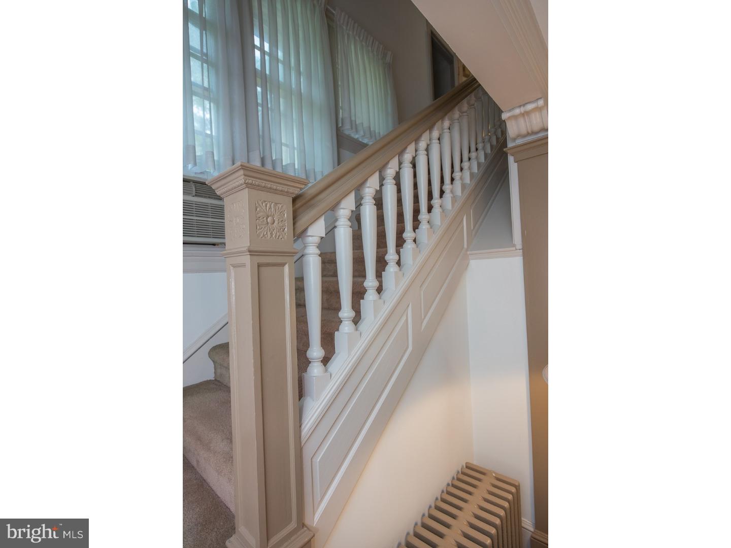 540 Manor Road Wynnewood, PA 19096 - Photo 4 of 25 a view of a hallway with staircase